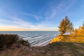 Beautiful views from the bluff at the end of the road about a 3-5 minute walk from the cottage, enjoy a picnic, or coffee while listening to Lake Michigan waves.