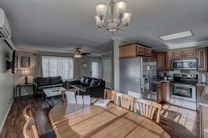 Main level living room, kitchen, and dining area