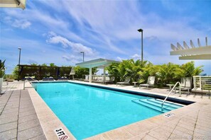 Sippin' on sunshine, loungin' by the pool.