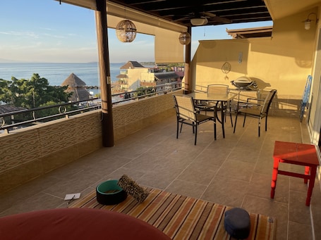 Spacious patio great for morning workouts and evening dinners. Shades for heat!