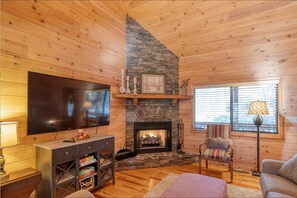 Seasonal use fireplace, smart TV, and assorted board games for your enjoyment!