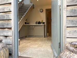 Entrance into hallway and kitchen 