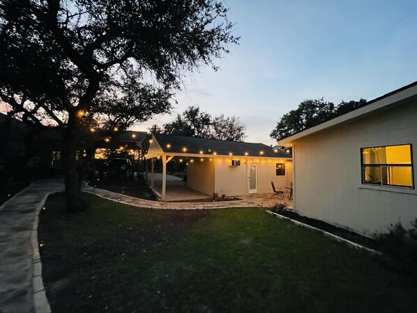 View from beside cottage #3 looking past #2 to #1 and the carport.
