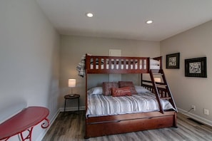 Twin over Full Bunk Beds with a Twin Trundle. This room sleeps four. The kids will love it!