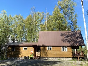 Birch-lined driveway leads to your private cabin, not visible from road. 