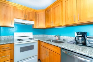 Full kitchen with cooking utensils