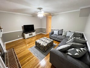 Sit back and relax with family and friends in this cozy living room space!