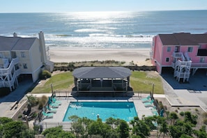 Enjoy the outdoor pool with ocean views and a gazebo. Less than a couple minute walk away!