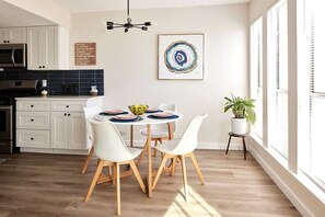 Beautiful dining area in the kitchen for you to enjoy a meal after a day of exploring all the fun things to see in Austin TX. All of our properties feature live plants!  We as that our guests please help water them once a week!