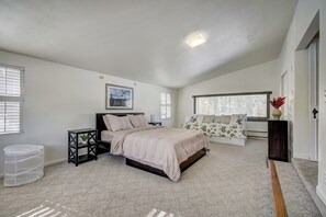 Spacious master bedroom on the 2nd floor with a queen bed and day (king) bed.