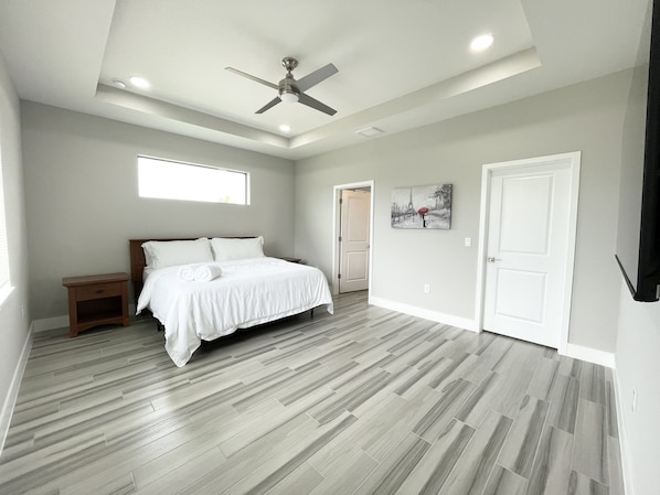 Master Bedroom, king bed, 65in 4k TV