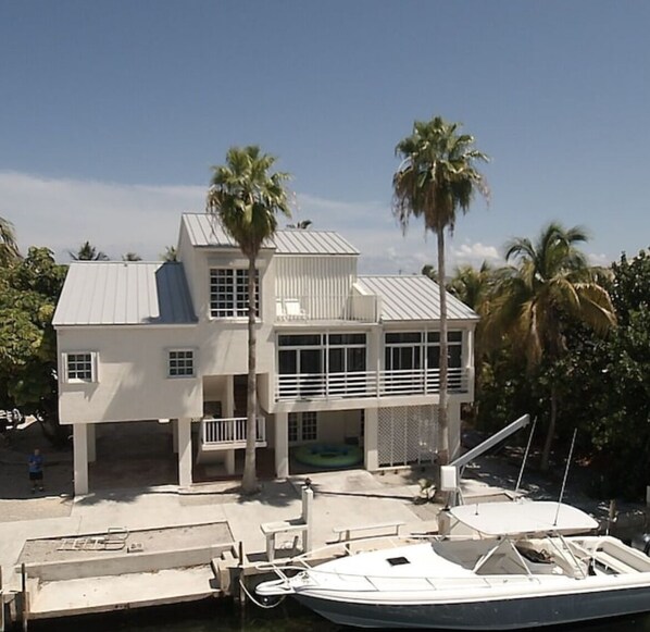 Rear View of home with plenty of dock space