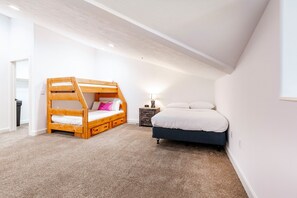 Upstairs Living Area With Twin-over-Full Bunk and a Double Bed