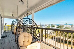 Float away in these hanging chairs on the third floor