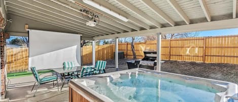 Movie night, upgraded: Chill in the jacuzzi while your favorite films light up the night, right in your backyard. It's the cozy, splashy cinema experience you never knew you needed.