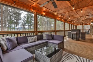 A  40-Inch TV Sits above this Sofa for a night of entertainment under the stars
