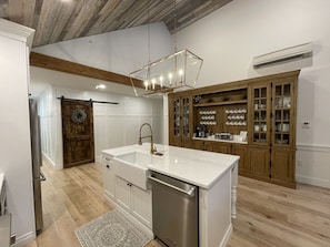 Large, open, fully equipped kitchen.