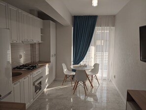 Living room + Kitchen