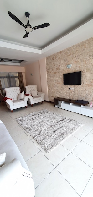 Living room w/ luxury comfortable chairs and carpet