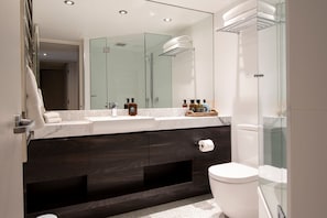 The bathroom has underfloor heating and  Lief bathroom products are supplied.