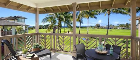 Lanai with golf course and distant ocean view