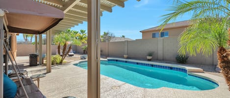 Backyard Pool with Large Pergola covering