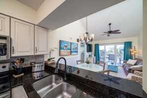 The updated kitchen lets you be a part of the whole living area