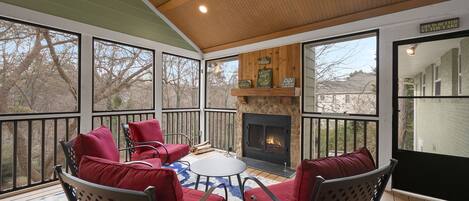 Spend hours together around the outdoor fireplace with tv. 