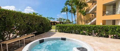 Your own private hot tub awaits you at the Coral Sea Garden Three-bedroom condo