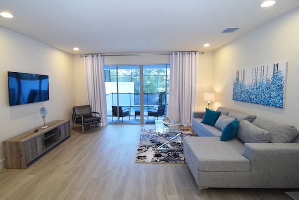 Brand new townhome with open-plan living space out to the patio and dip pool