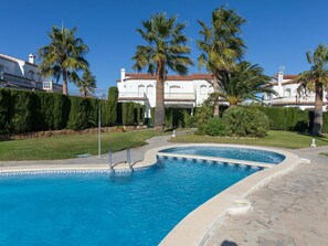 Water, Plant, Sky, Building, Property, Swimming Pool, Tree, Azure, Seaside Resort, Arecales