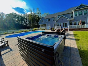 6 person hottub & in-ground heated pool in large fenced in back yard on 10 acres