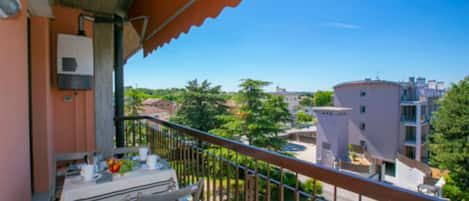 Balcony with table and chairs