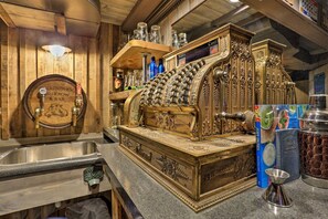 Groundhog Burrow - a custom-built, small basement bar w vintage cash register. 
