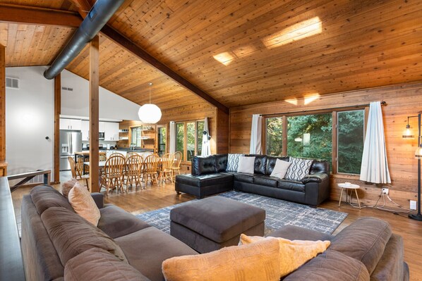 Large great room with vaulted ceiling.