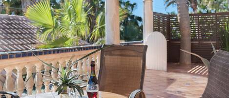 red wine on the lush enclosed patio