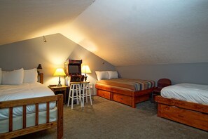 Loft area, 2 full sized beds and a queen bed