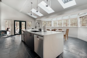 Huge Kitchen with Windows and Skylights