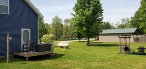 Back deck with chairs and BBQ