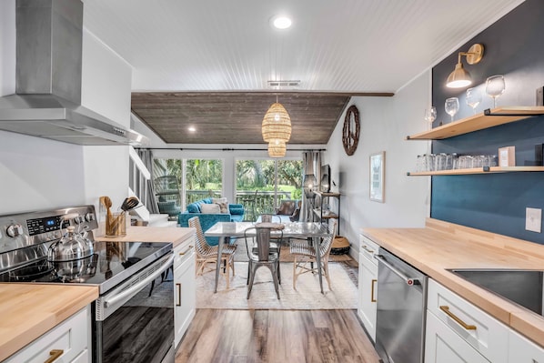 Step into our modern kitchen where style meets function. Perfect for gathering.