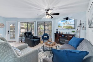 This space features a prominent recliner, ensuring ultimate comfort for movie nights or quiet evenings.