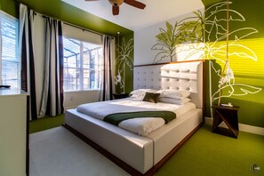 "In the Wild" themed bedroom | King bed | USB chargers | Smart TV | OMG Design!