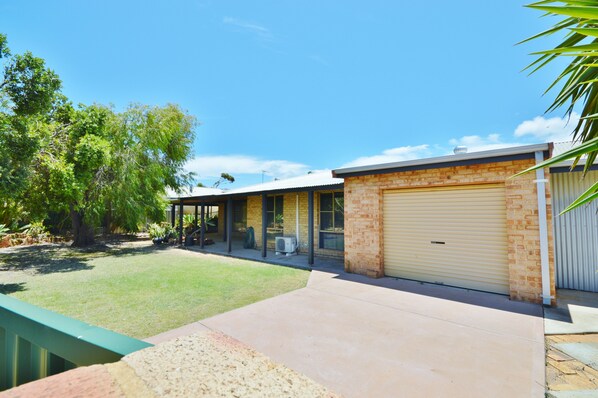 Front of Proprety - Front of property with gated driveway and fully enclosed backyard.