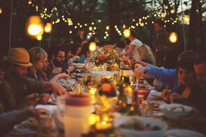 Gather around the unique hand made table for a family meal. Designed for 12-14 people to enjoy the food together!