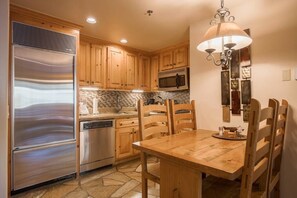 Full Kitchen with gas range and stainless steel appliances