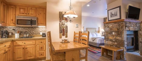Cozy and comfortable layout with full kitchen, king bed and queen sleeper couch.