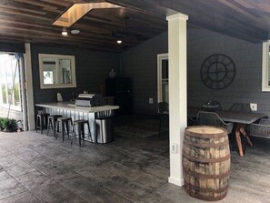 Covered veranda area near pool