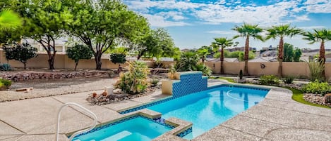 Pool and hot tub with plenty of room for the kids to play