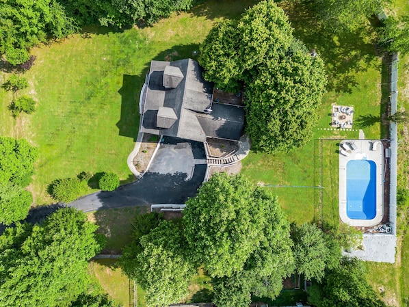 There is no shortage of trees on this property. While fall, summer & late spring display the richest foliage, you'll enjoy the natural beauty that surrounds you – no matter the season.