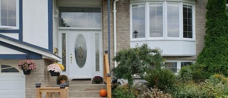 Front Yard, Entrance, and the Driveway, up to 2 car spaces for guests  